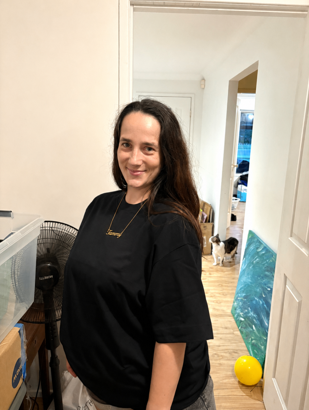 Tammy wearing a personalized necklace