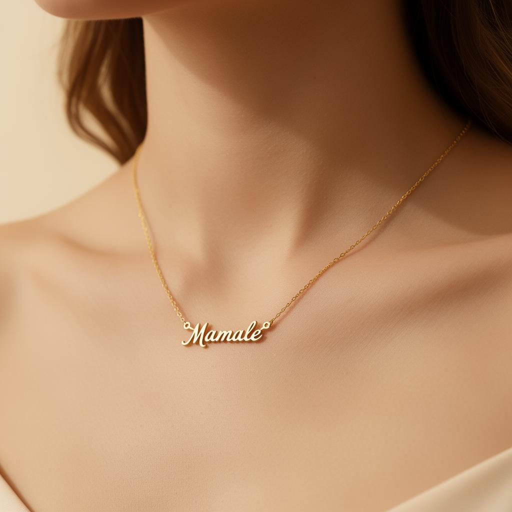Close up of a gold name necklace